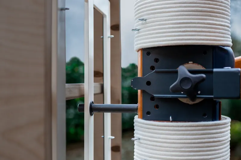 Locking bar inserted into the body of the Wooden Buddy